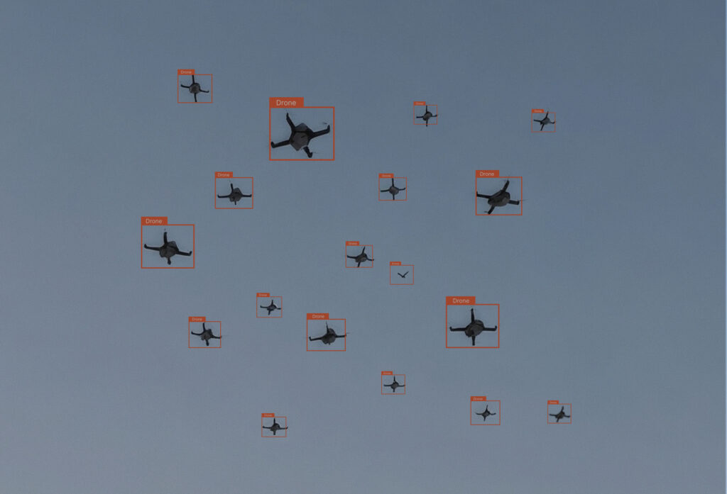 Object detection model bounding box incorrectly identifying a bird as a drone, illustrating a false positive in a defense computer vision system.